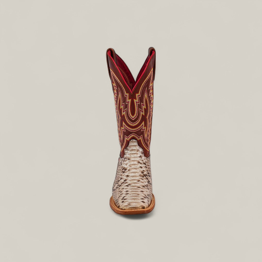 The Exotic Python - Natural - Square Toe boot features a light, textured lower inspired by python and a tall red upper with gold and brown stitching, shown from the front against a plain background.