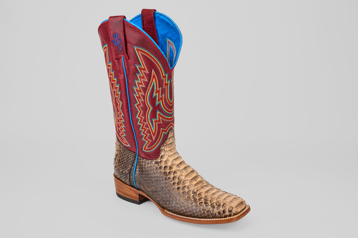 The Barlow - Taupe - Square Toe mens boot features a taupe python leather lower, tall red and blue upper, detailed yellow, blue, and red stitching, and a stacked heel for standout style.