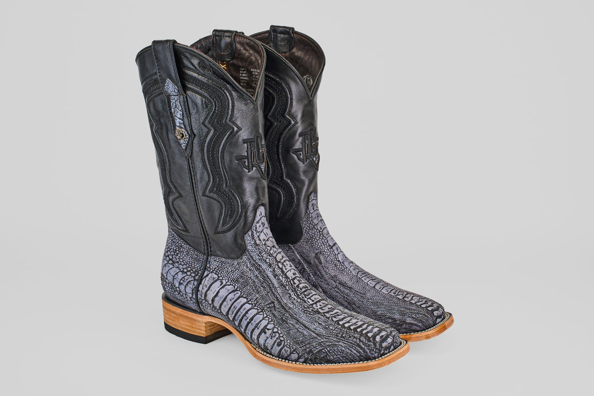 The Austin Leg - Blue Jean - Square Toe men's cowboy boots feature black ostrich leather uppers, gray textured lowers, and light brown wood heels and soles—a stylish choice that pairs perfectly with a blue jean finish.