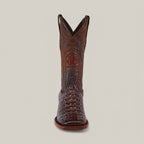 A single Alligatoar Horn Back Print Brown cowboy boot with intricate stitching and embossed shaft design features a square toe and textured crocodile-patterned leather, centered against a plain, light background.