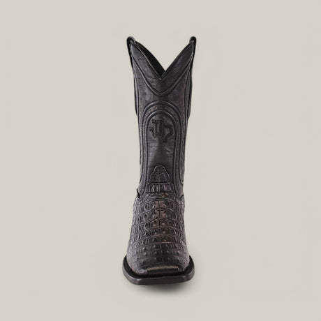 The Alligatoar Horn Back Print Black - Square Toe boot is front-facing, showcasing exquisite leather craftsmanship with a square toe and crocodile pattern. Decorative stitching highlights its elegance against a plain backdrop.