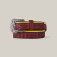 The Exotic Caiman Wine Belt, with its textured brown leather, features a large platinum buckle and yellow-blue accented edges, creating a striking contrast that makes it a true statement piece.