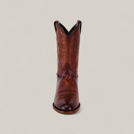 The Wyatt - Camel - Roper Toe boot is shown from the front, highlighting its quality camel-colored cowhide, decorative stitching, and slightly pointed toe against a plain light background.