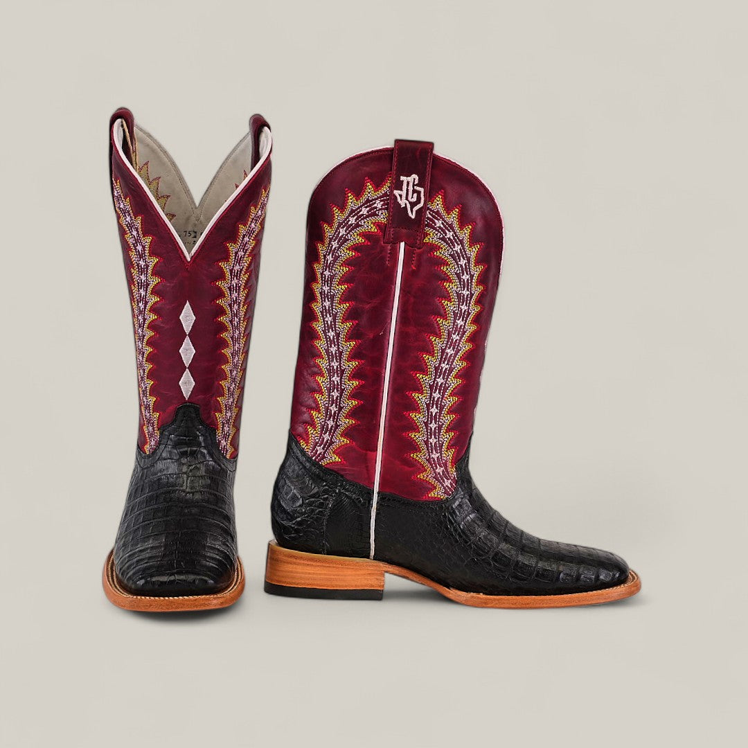 A pair of Exotic Caiman Horn Back - Black - Square Toe boots featuring black textured leather foot and heels, tall burgundy shafts with yellow, orange, and white stitching, shown side by side against a plain light background.