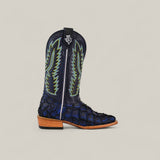 A single Exotic Pirarucu Fish - Navy Black - Square Toe boot, crafted from textured fish leather with light zigzag stitching, a wooden heel, and a black pull strap with a white logo. Set against a plain light background.