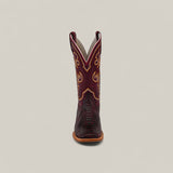 Front view of the Exotic Python - Blackcherry - Square Toe boot, featuring black cherry python-textured leather, detailed yellow and red stitching on the shaft, and a light brown sole, set against a plain light background.