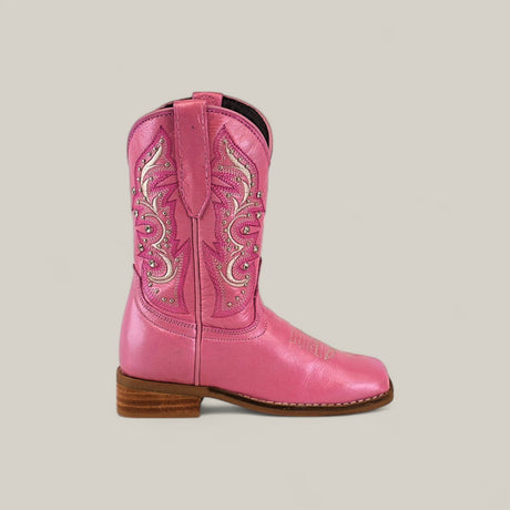 The Amara Pink - Square Toe - Kids Boots showcase decorative stitching and a low wooden heel, displayed in profile on a plain light background. Available in childrens sizes.