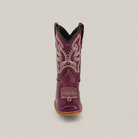 The Blake Purple - Square Toe Kids Boot in maroon features decorative white and tan stitching with small metallic studs, shown front-facing on a light background to showcase its stylish design and comfortable fit.