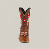 The Karo Brown – Square Toe Kids Boots feature brown leather with red and white floral embroidery and decorative stitching, blending classic style, comfort, and elegance. Shown from the front against a plain light background.