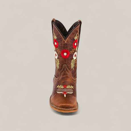The Karo Brown – Square Toe Kids Boots feature brown leather with red and white floral embroidery and decorative stitching, blending classic style, comfort, and elegance. Shown from the front against a plain light background.