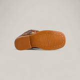 The Karo Brown - Square Toe - Kids Boots is shown lying on its side, featuring embroidered floral designs on brown leather and a flat, light brown rubber sole with textured grip patterns, blending comfort and elegance against a plain background.