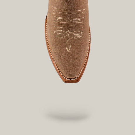A Miranda Suede Khaki Boot with leather sole and snip toe, featuring decorative white stitching, photographed from above on a light beige background.