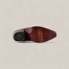 A single Kellie Clayton Black Leather Sole - Tall Shaft - Snip Toe boot is shown from the sole, featuring a brown wooden finish with Texas Country branding and a gold logo near the heel on a neutral background.