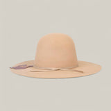 The 10x Belly - TC Hats is a brown Western hat featuring a brown ribbon and a shapeable crown.