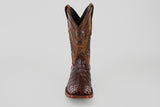 The Exotic Caiman Hornback - Brown - Rodeo Toe is a single cowboy boot made from genuine caiman leather, showcasing a crocodile-like texture and decorative upper stitching, displayed front-facing on a plain light background.