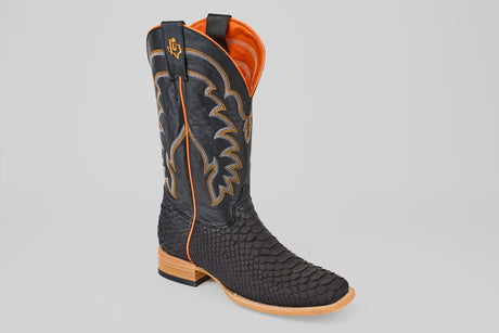 The Wayne - Matte Black - Square Toe boot features a textured, scale-like pattern, orange stitching and lining, light brown sole and heel, plus decorative shaft embroidery—part of the Wayne Diamond Collection.