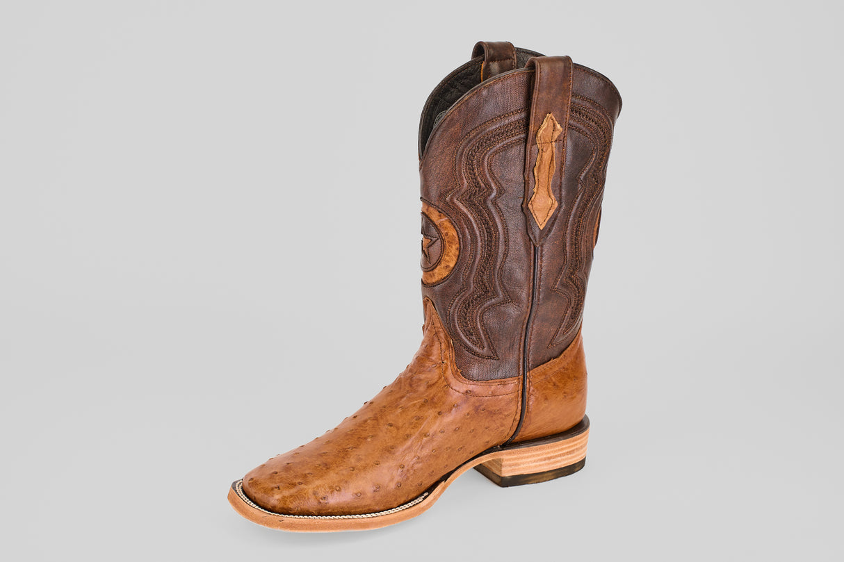 The Exotic Full Quilt Ostrich - Brandy Brucciato - Square Toe features a light tan ostrich lower, dark decorative shaft, classic square toe, and stacked heel for a timeless cowboy boot look.