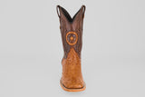 The Exotic Full Quilt Ostrich - Brandy Brucciato, a single square toe cowboy boot in rich brown with a decorative star emblem on the front, is displayed upright against a plain light gray background.