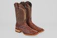 The Exotic Full Quilt Ostrich - Brown - Square Toe boots feature textured ostrich leather, decorative shaft stitching, and light wooden heels, displayed against a plain gray background.