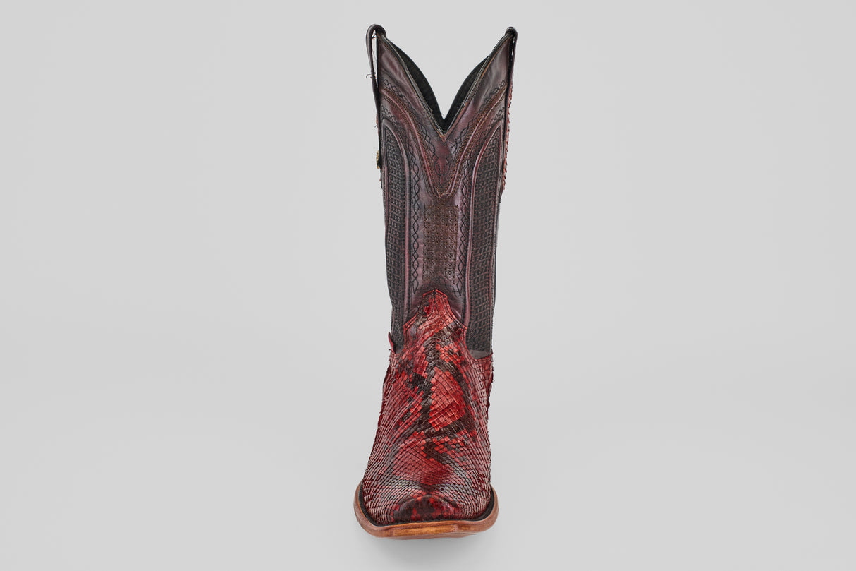 A single Tanner – Ruby – Narrow Square Toe cowboy boot in red python leather with intricate stitching, upright and facing forward against a plain white background.
