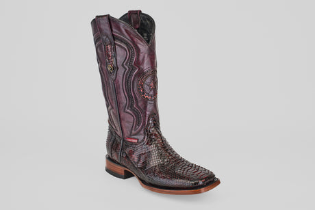 The Tanner - Black Cherry - Square Toe is a tall cowboy boot in burgundy with intricate stitching and a textured Python Blackcherry snakeskin foot, shown against a plain white background.