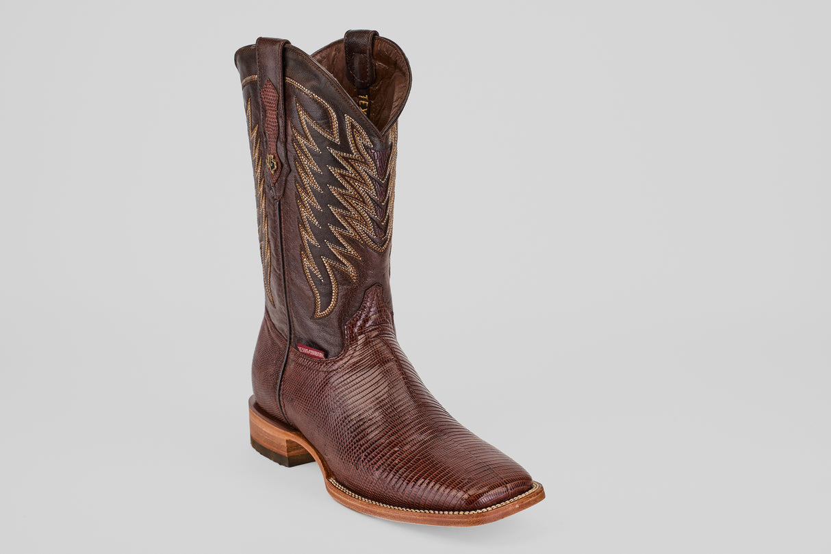 The Blaze – Brown – Square Toe Cowboy Boot features textured leather, decorative shaft stitching, a square toe, and a wooden heel, shown on a light gray background—ideal for classic western boot enthusiasts.