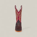 The Maverick - Wild Cherry - Square Toe boot features a dark brown textured lower, a red upper shaft with yellow and orange stitching, and a square toe, displayed facing forward against a plain light background.