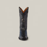 The Cuadra Lisboa Blue Python boot features a striking python pattern with a narrow square toe. A distinct copper buckle etched with a C accents the side, while its shiny texture and tan interior lining enhance its sleek allure.