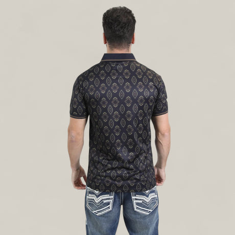 A man faces away from the camera, wearing the Mens Modern Fit Stretch Cotton Black Polo with Aztec Print - AZP10859 and blue jeans with white-stitched back pockets, set against a plain light background.