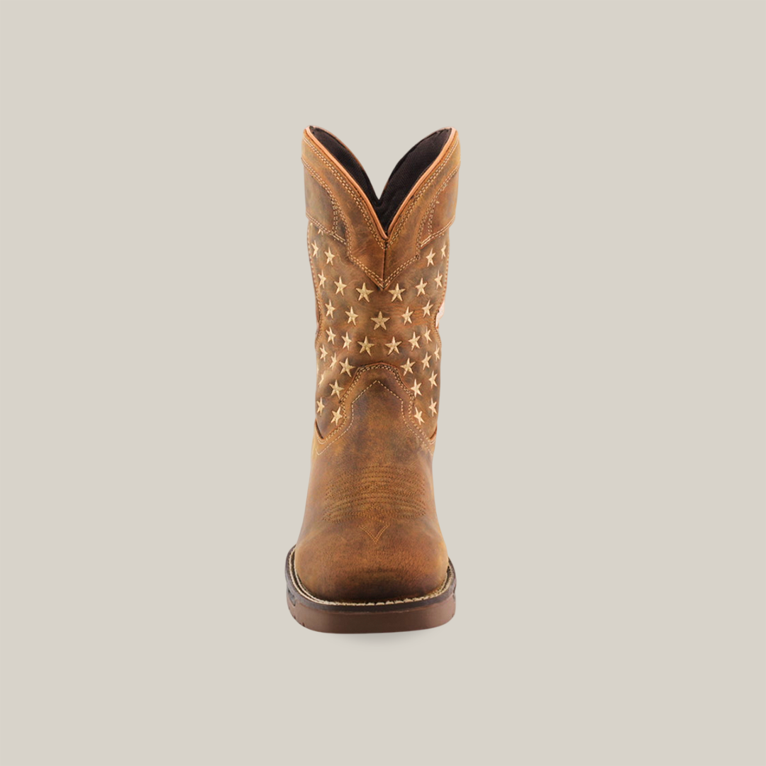 Close-up of the White Tan US Flag cowboy boot, handcrafted with decorative stitching on the toe. This waterproof, soft-toe boot has a square toe design and a black and white stitched welt. Made from cowhide leather, it boasts a worn finish for an appealing vintage look.