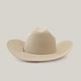 The 500X Superior Belly is a premium Western cowboy hat in light tan, crafted from 100% belly beaver fur. It features a wide brim and a teardrop-shaped crown, set against a plain white background.
