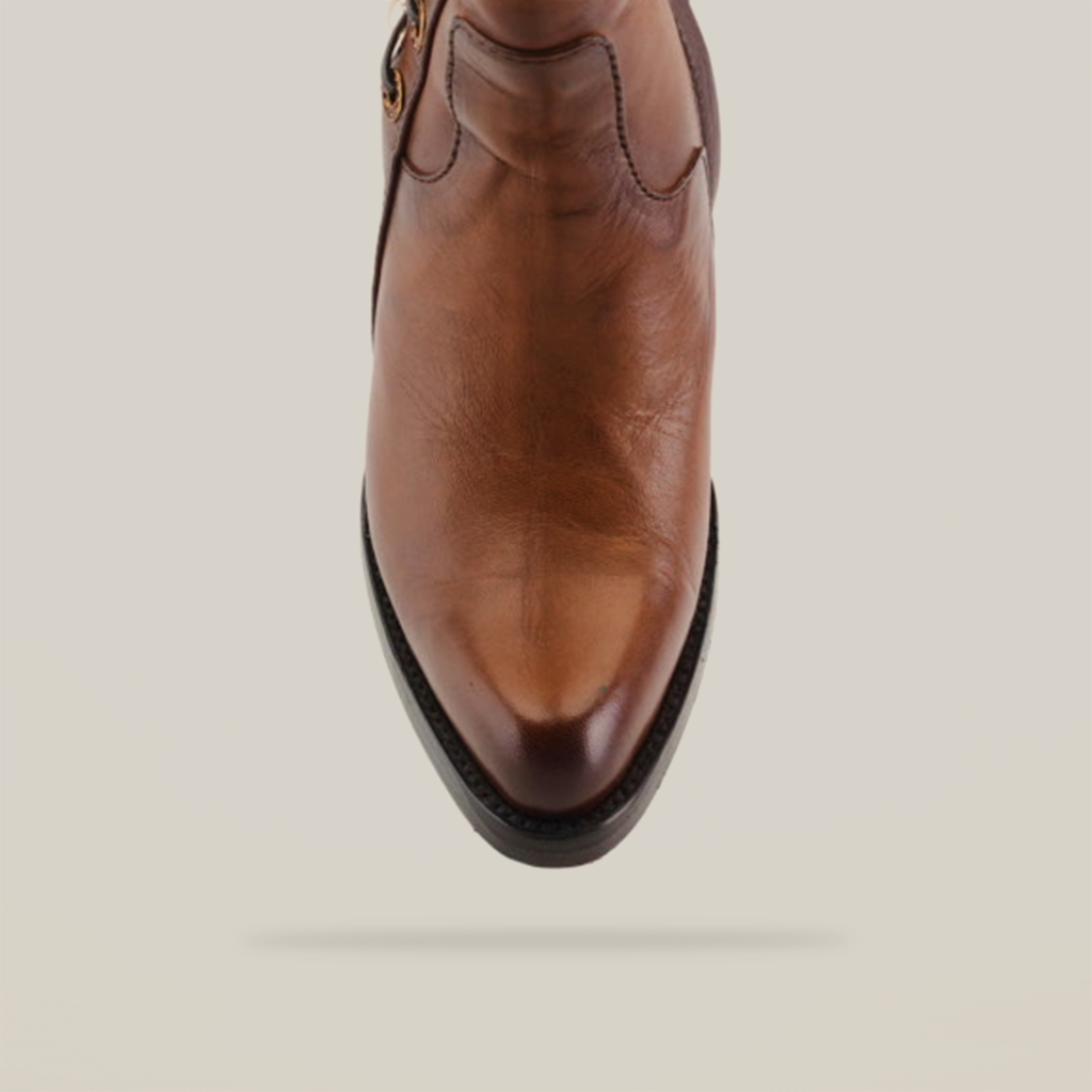 Top view of the Francia Rings Bootie Tan - J Toe in brown luxurious leather, showcasing its strap and side buckle. It features detailed stitching and a smooth finish, set against a white background.
